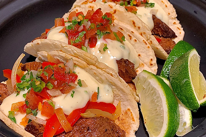 BC ancho-Lime Beef Fajitas with White Cheddar Queso